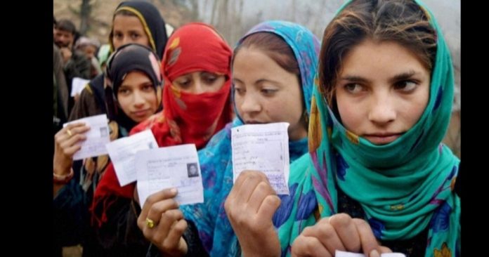 Voters in queue to their vote in J&K . A file photo